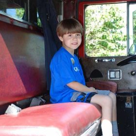 Ride For Wishes wish kid in fire truck